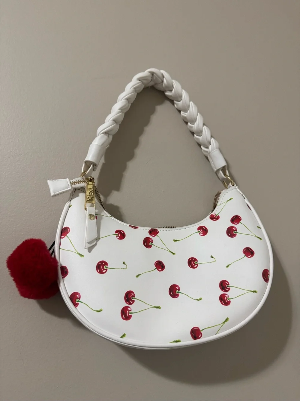 XOXO White Cherry-Print Shoulder Bag with Red Pom Charm
